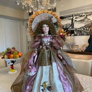 Elegant an Precious Porcelain Collection dolls 28”